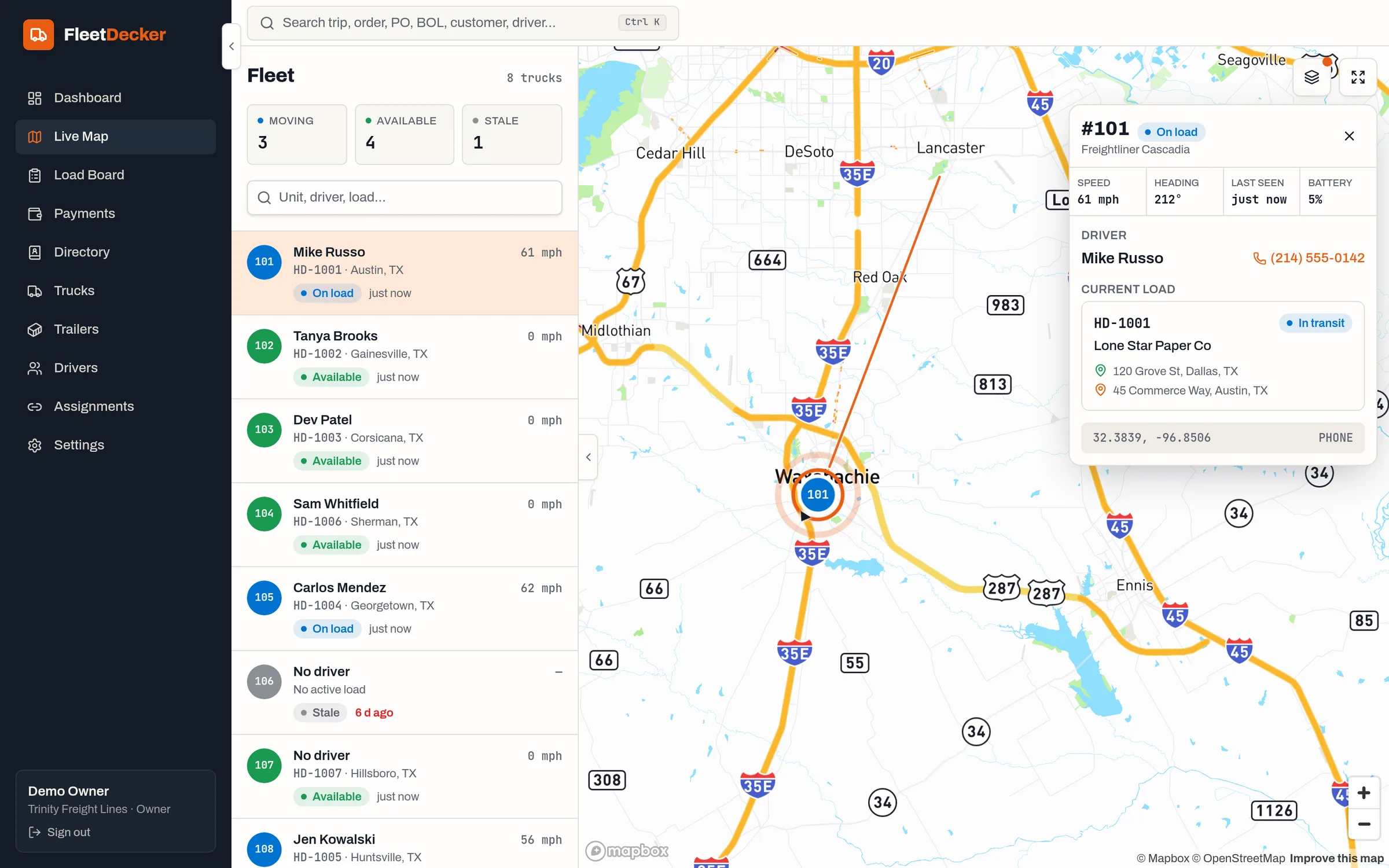 FleetDecker Live Map showing trucks moving on Texas interstates with a truck's details open